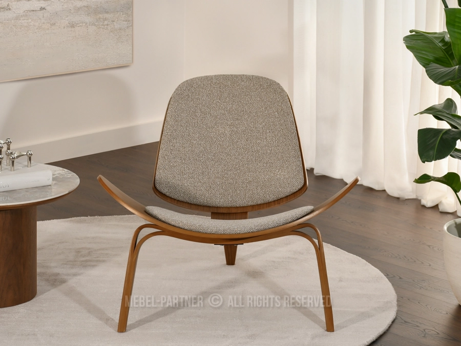 Design, styl i aranżacyjne inspiracje z fotelem Roland