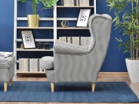 Designerski fotel skandynawski MALMO pepitka w aranżacji z regałem TOWER