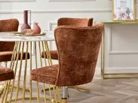 Obrotowy fotel SELLA CROSS MIEDŹ ZŁOTA NOGA - tapicerowany tył siedziska