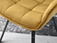 Wygodne krzesło do jadalni ZŁOTE ARUBA NA CZARNEJ NODZE - krzesło z profilowanym siedziskiem