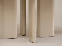 Modny okrągły stół o płynnych liniach NAOMI BEŻOWY POŁYSK - designerska, zaokrąglona podstawa