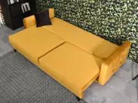 Rozkładana kanapa pikowana AURA MUSZTARDOWA - funkcja spania