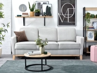 Skandynawska sofa BERGEN rozkładana na drewnianych nóżkach - w aranżacji ze stolikiem KODIA S