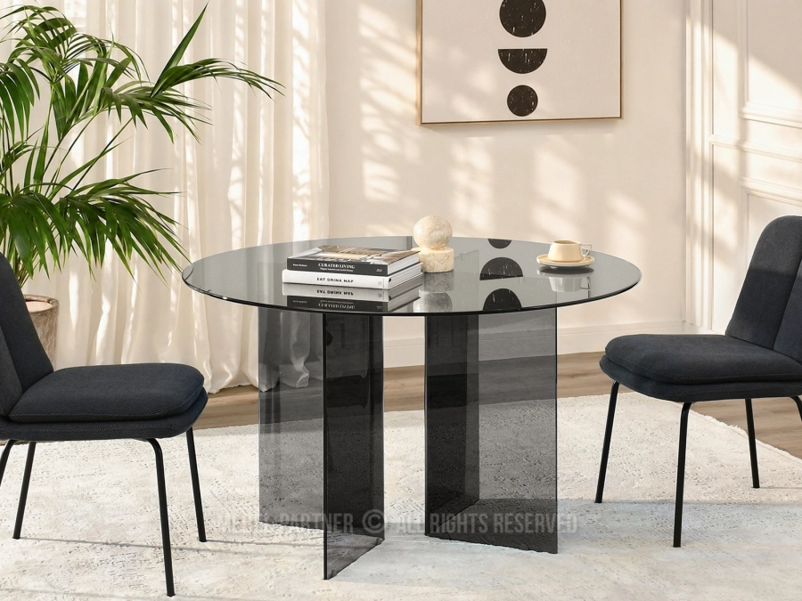 Szklany stół z okrągłym blatem - idealny mebel do eleganckiego salonu lub kuchni